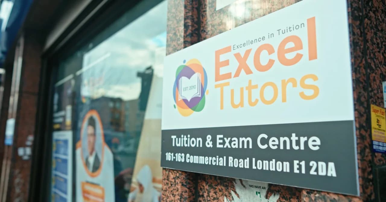 The Excel Tutors centre signboard on Commercial Road, Whitechapel
