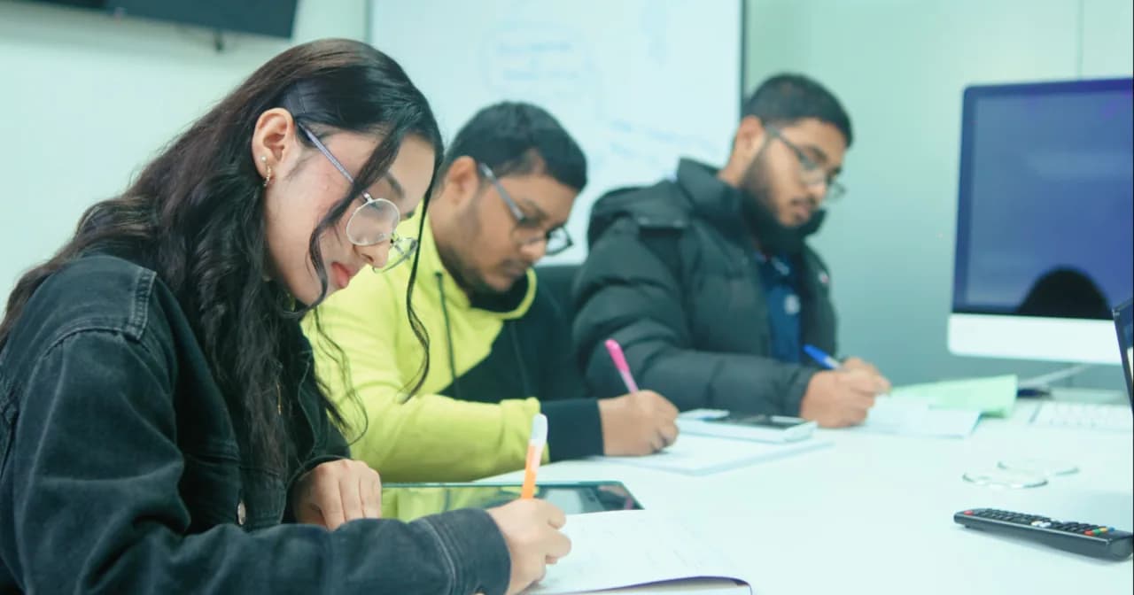 Students coding at the Excel Tutors computer suite